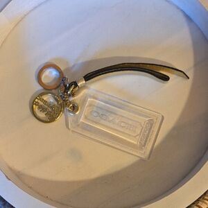 Coach Gold and Black Charm Keychain Poppy